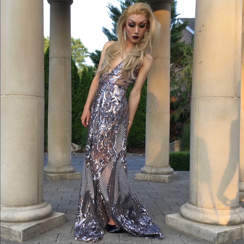 Beautiful silver gown with a slit and mesh area